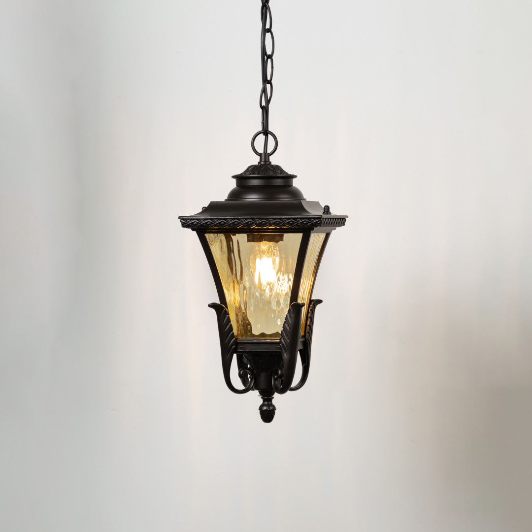 Vintage black metal hanging lantern light with textured glass for elegant balcony lighting decor.