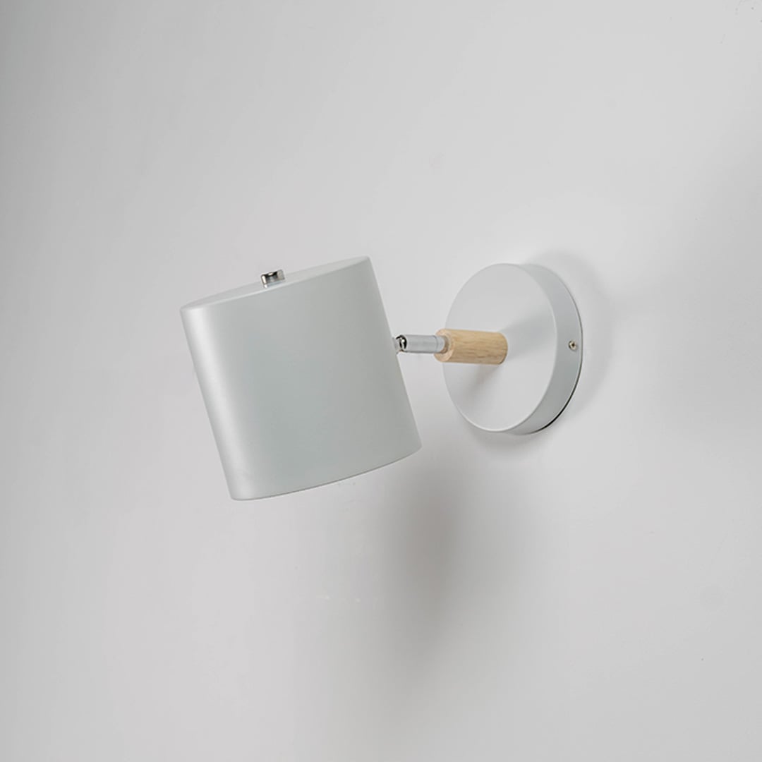 White metal wall lamp displayed unlit on white background highlighting simple form and wall mount for contemporary home lighting.