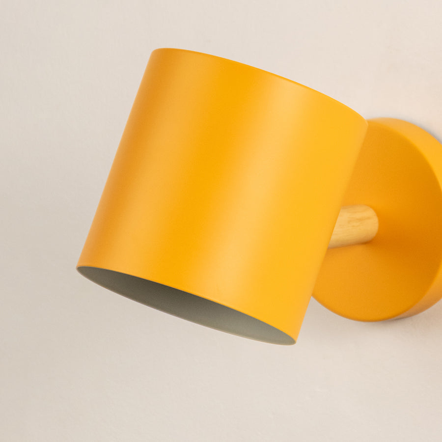 Modern yellow metal spotlight wall light with sleek matte finish for stylish contemporary interiors.