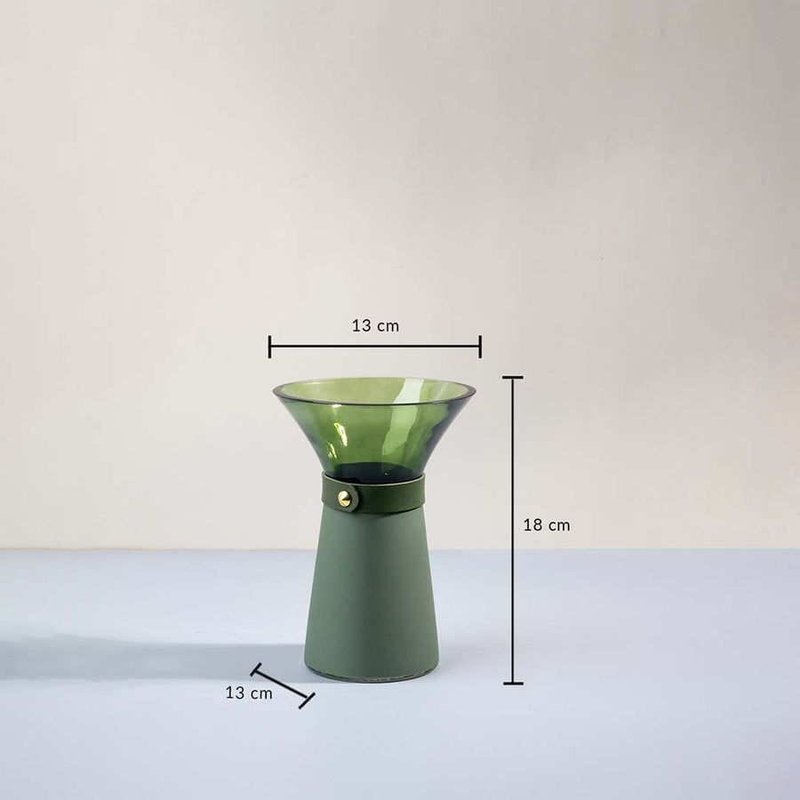 Green glass vase with 18 cm height 13 cm width and wide mouth opening shown clearly for decorative interior use.
