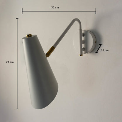 White cone wall light with brass arm shown with dimensions 32 cm width and 21 cm height highlighting elegant structure.