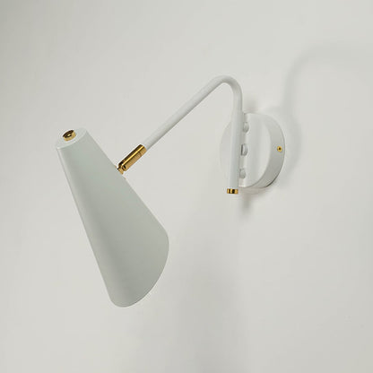 White cone wall light with brass fittings turned off on white wall displaying its clean and contemporary silhouette.
