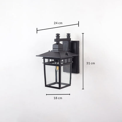 Outdoor wall lantern light with measurements 24 cm depth 18 cm width and 31 cm height on white background.