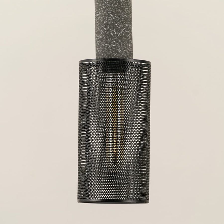 Closeup of Arlo Mesh pendant light showing fine perforated metal detailing and elegant cylindrical structure.