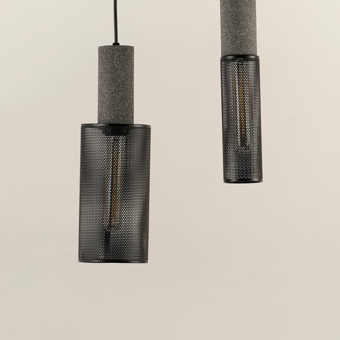 Arlo Mesh pendant lights turned off showcasing sleek matte black cylindrical design with perforated metal shades.