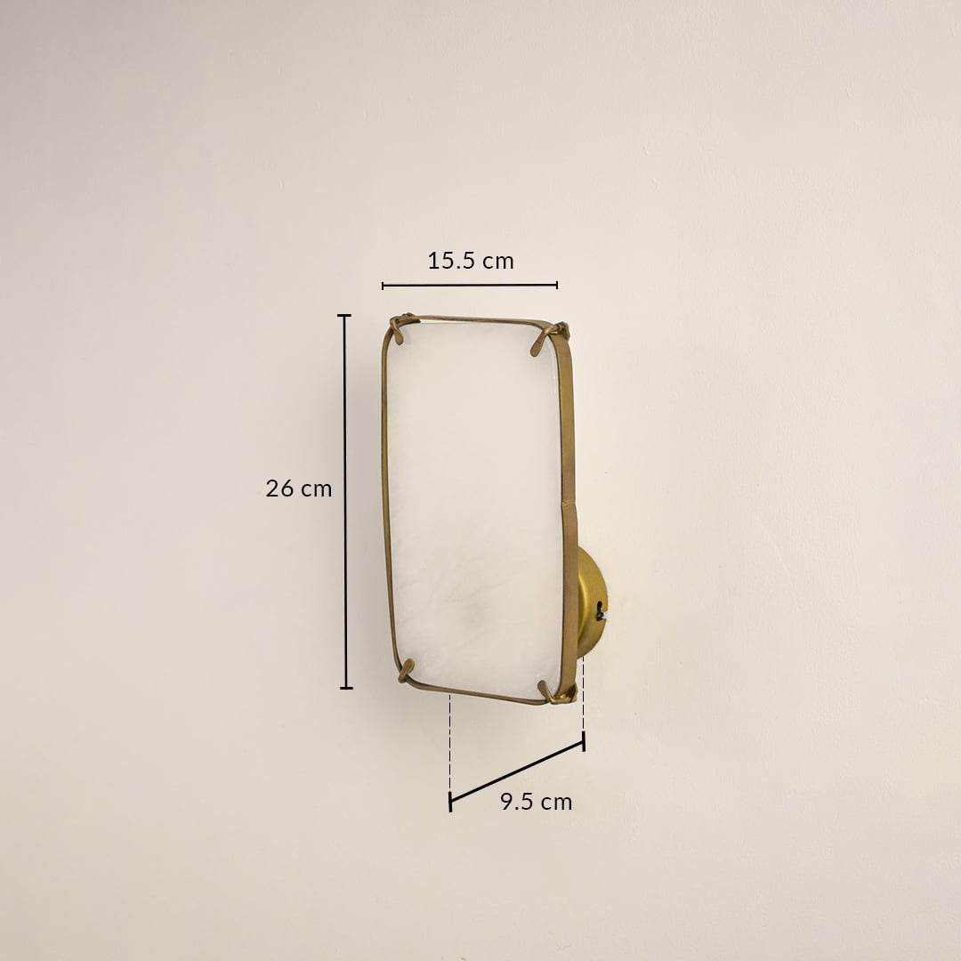 Marble gold wall light with 24 cm height 15.5 cm width and 9.5 cm depth for modern decor spaces.
