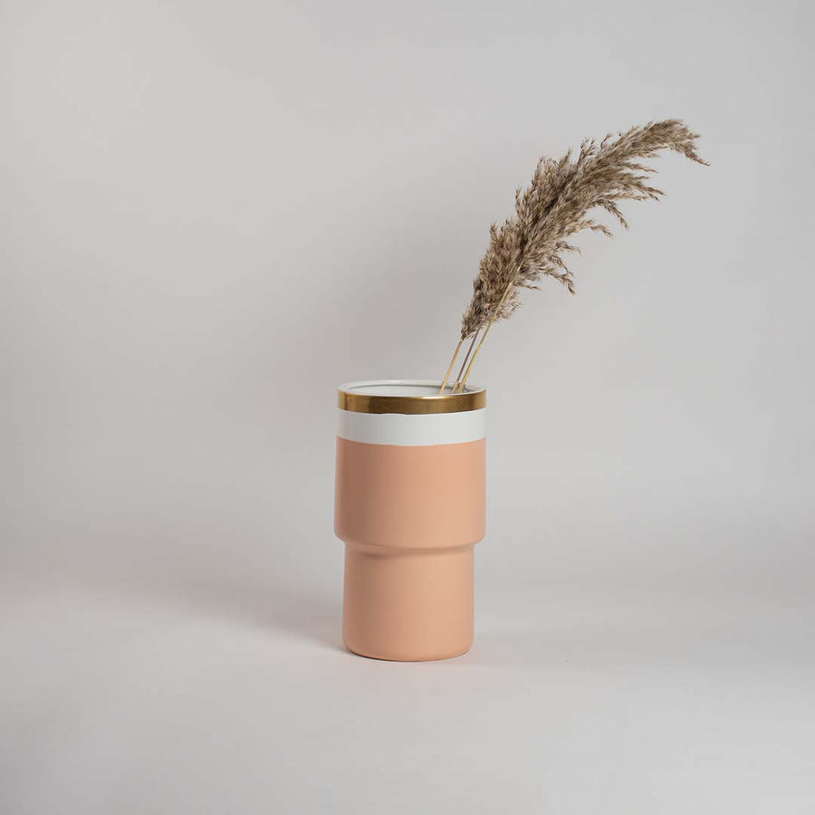 Peach ceramic vase with smooth matte finish white band and gold rim displayed on a white background for refined modern styling.