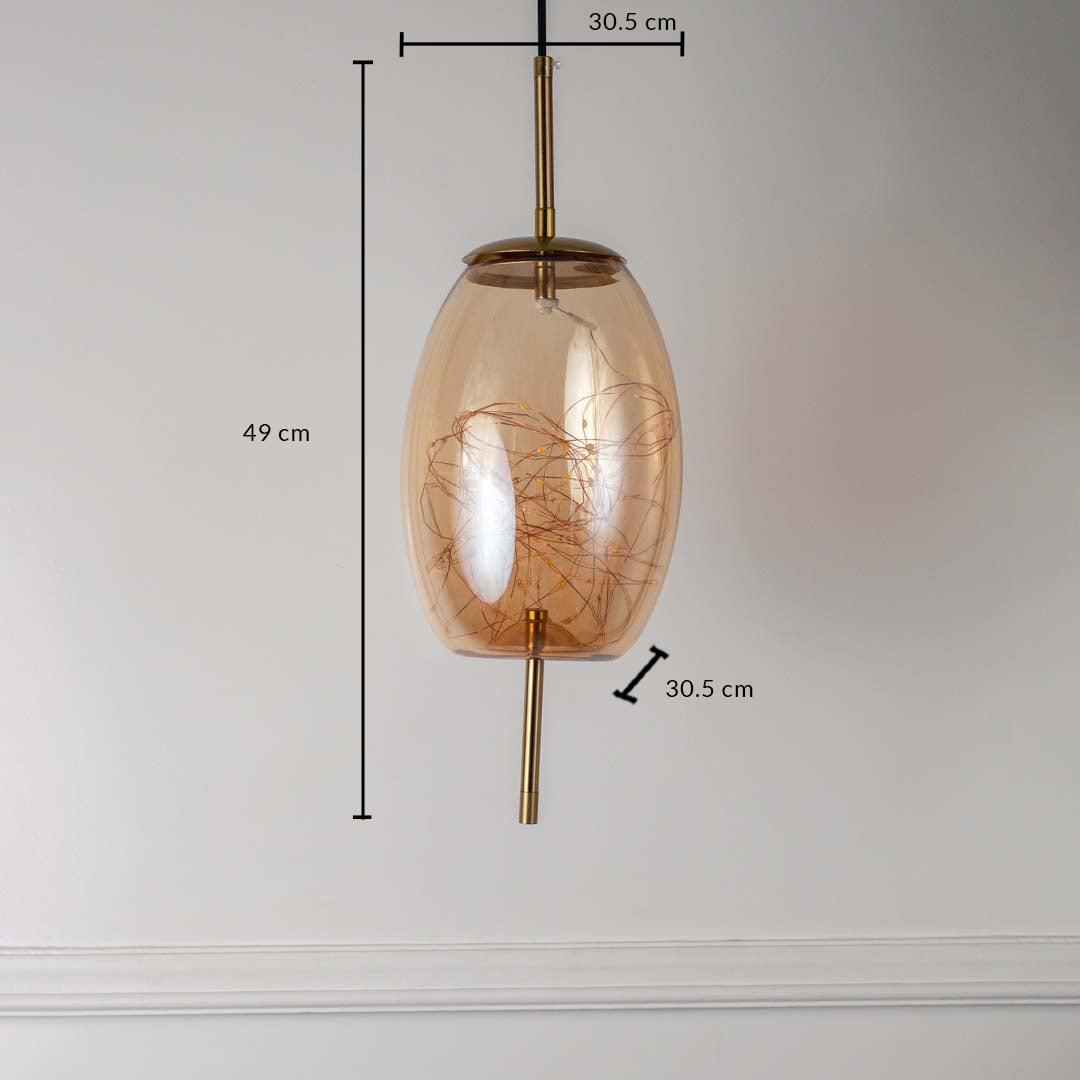 Amber glass and gold pendant ceiling light with height 49 cm and width 30.5 cm shown clearly on off white background.