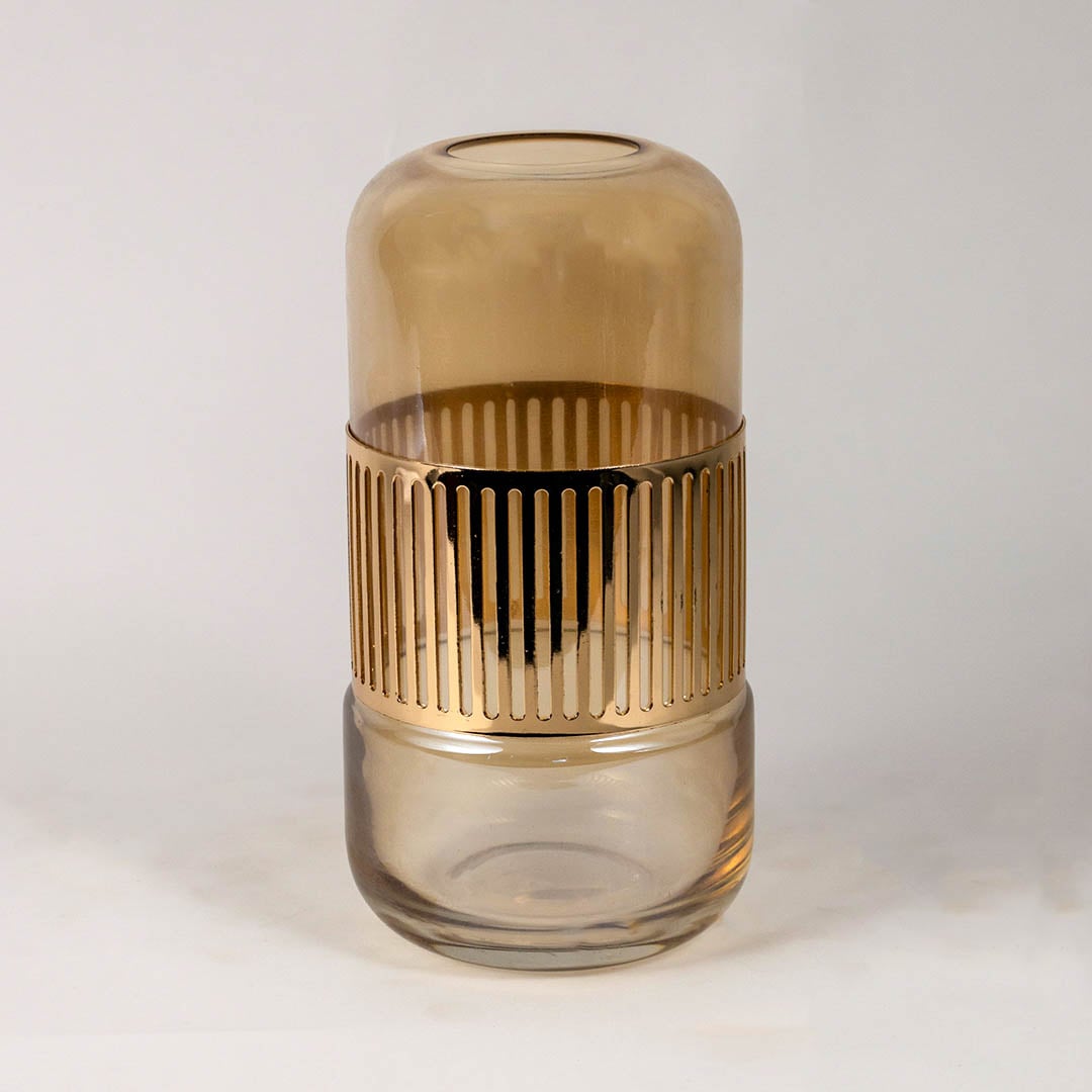 Tall amber gold vase with ribbed metallic design and rounded top shown against a clean white background.