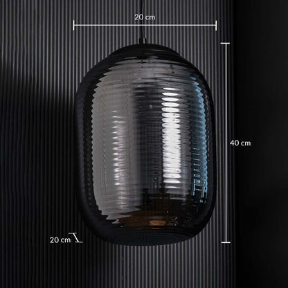 A ribbed smoked glass pendant light with clear dimensions measuring 40 cm height and 20 cm width and 20 cm depth for perfect placement guidance.
