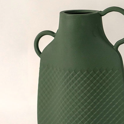 Closeup of Haven vase showcasing detailed geometric texture and smooth matte ceramic craftsmanship.