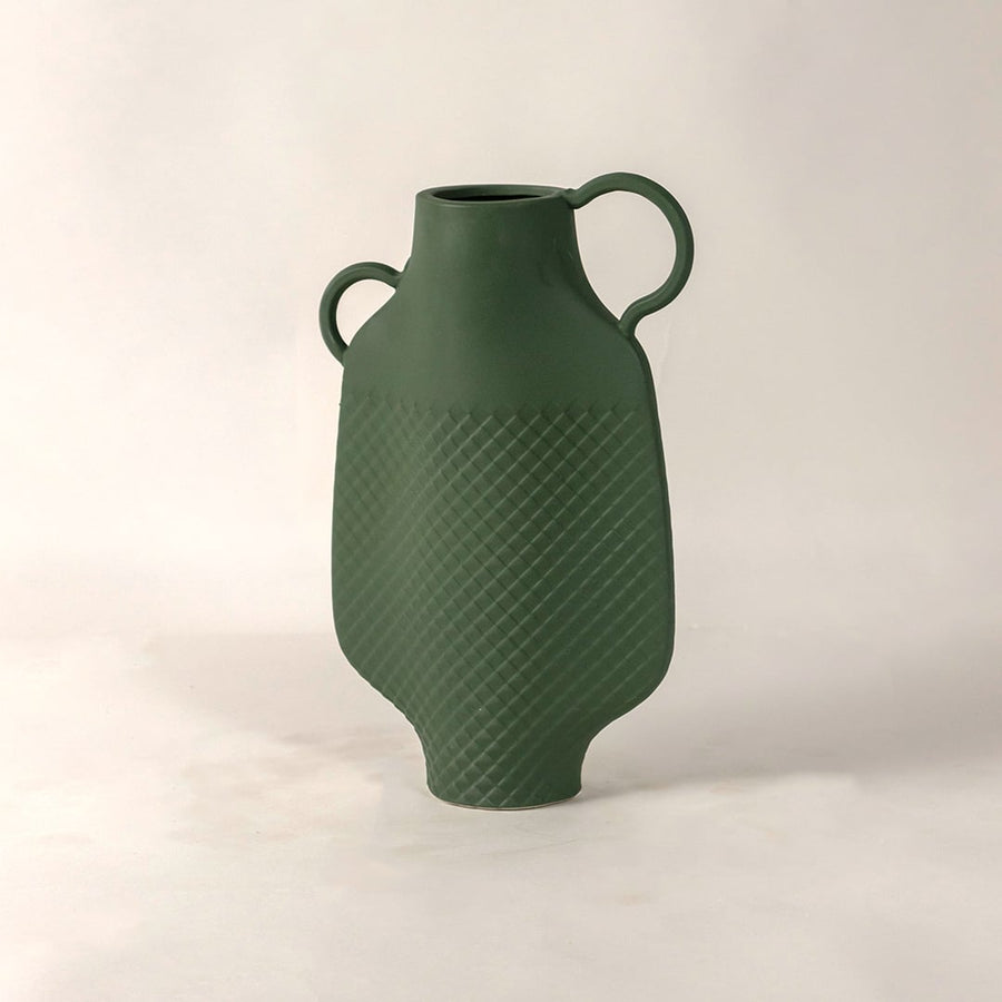 Side view of Haven green vase highlighting its curved silhouette geometric texture and modern twin handle design.