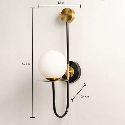 Black gold wall light with 57 cm height 18 cm width and 24 cm depth for modern decor styling spaces.