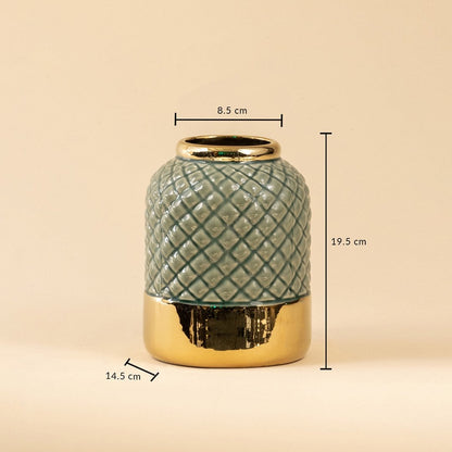 Gold and blue ceramic vase measuring 19 cm in height and 14 cm in diameter featuring a quilted texture and glossy metallic finish.