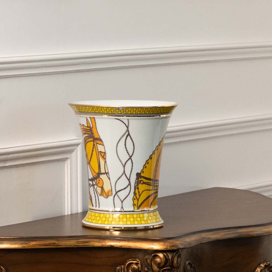 White and gold vase with abstract botanical artwork shown in a closeup view revealing graceful linework artistic elegance and premium handcrafted décor suited for modern luxury homes.