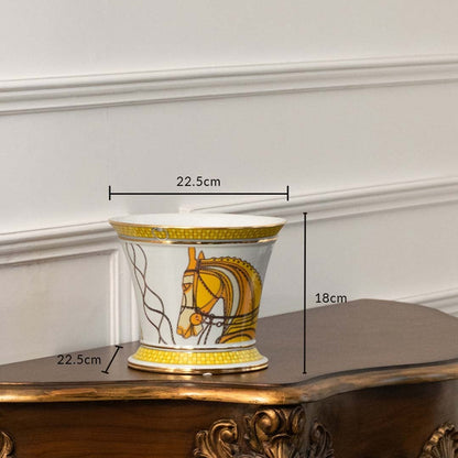 White and yellow ceramic jar with horse artwork in a front view measuring 27.5 cm width and 25.5 cm height ideal for stylish décor accents.