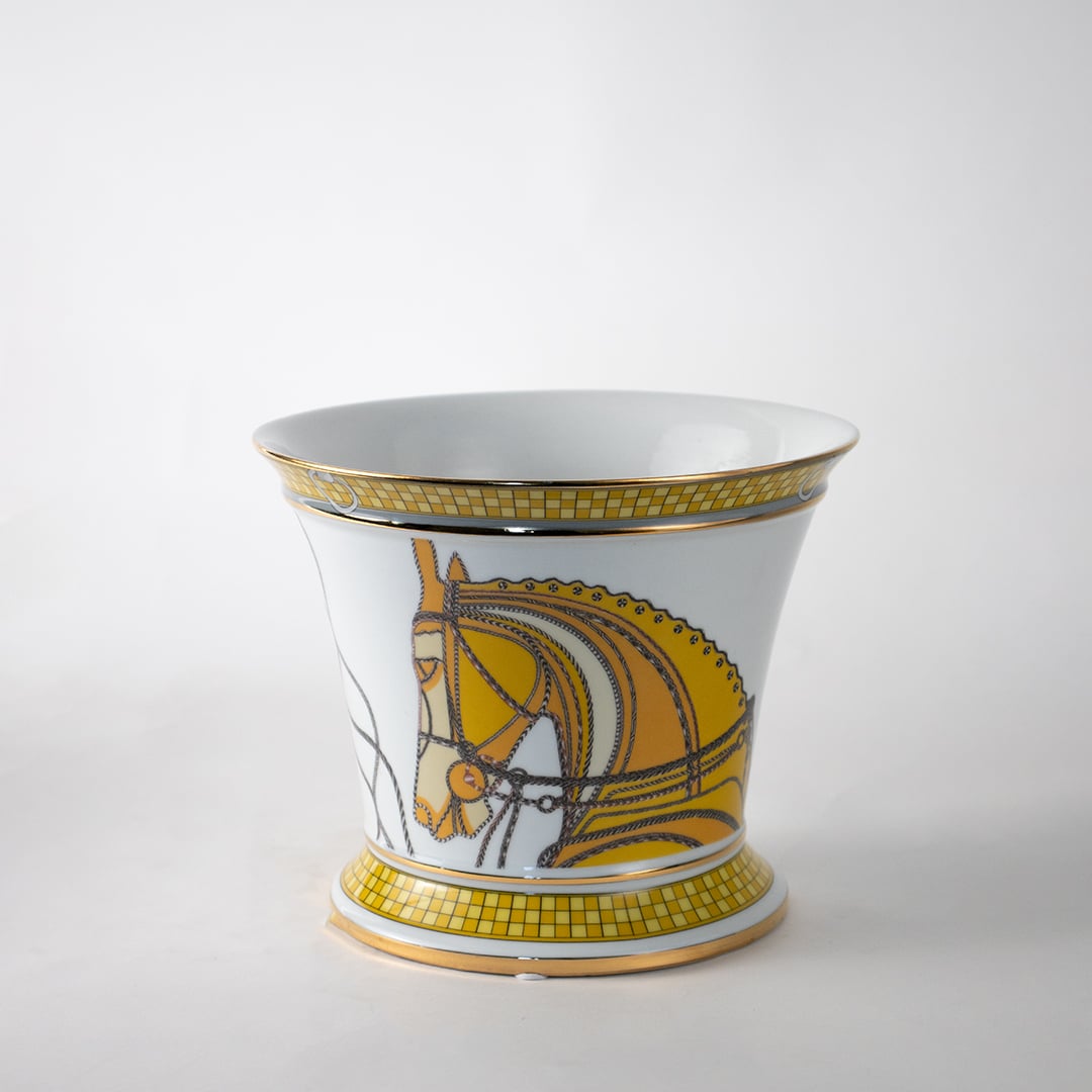 White ceramic jar with gold and yellow horse artwork perfect for luxury décor styling and elegant table display.