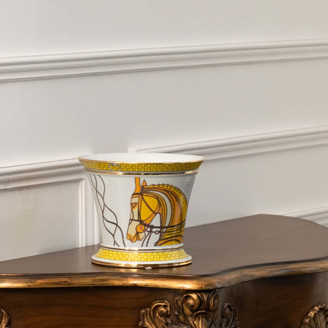 White ceramic jar with gold and yellow horse artwork in a front view ideal for upscale décor styling and decorative tabletop display.