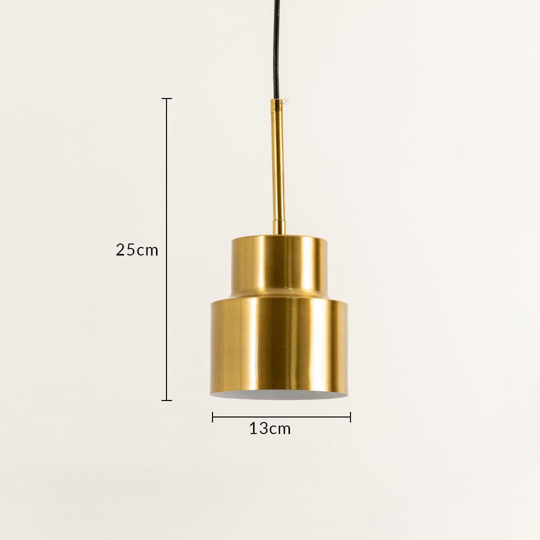 A tiered metal pendant light measuring 25 cm height and 13 cm width shown with warm illumination against a neutral beige background creating sculptural modern metallic