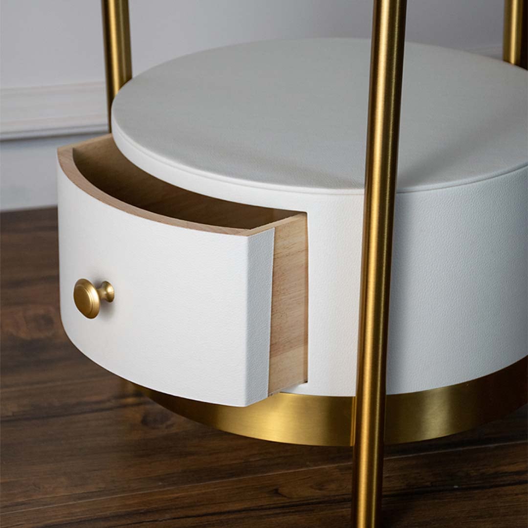 Detailed gold floor lamp head with sleek curved design and polished golden finish paired with side table.