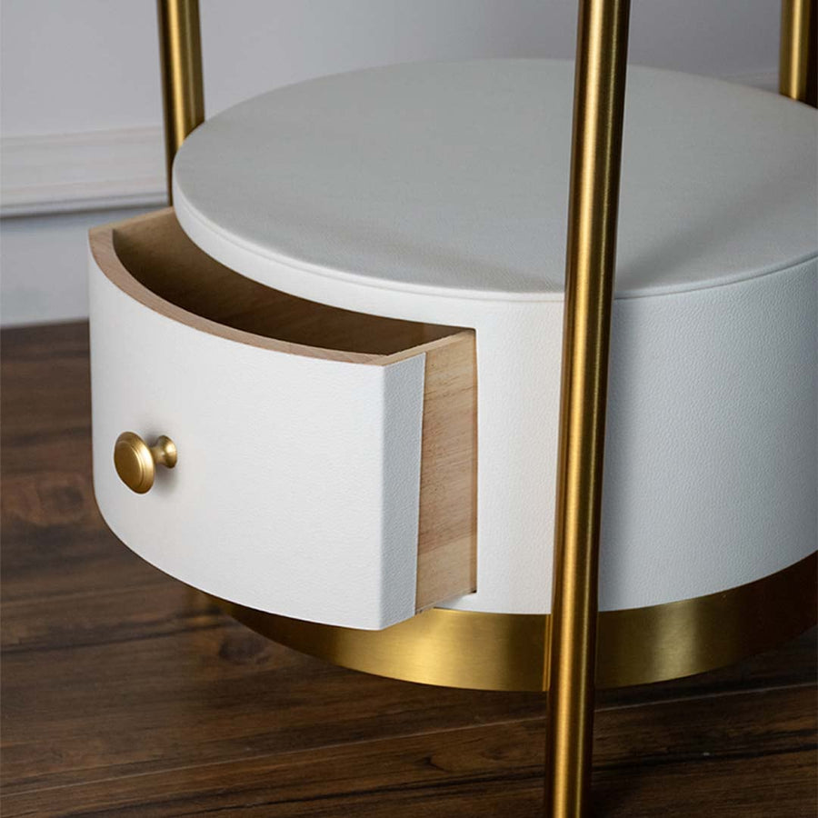 Detailed gold floor lamp head with sleek curved design and polished golden finish paired with side table.