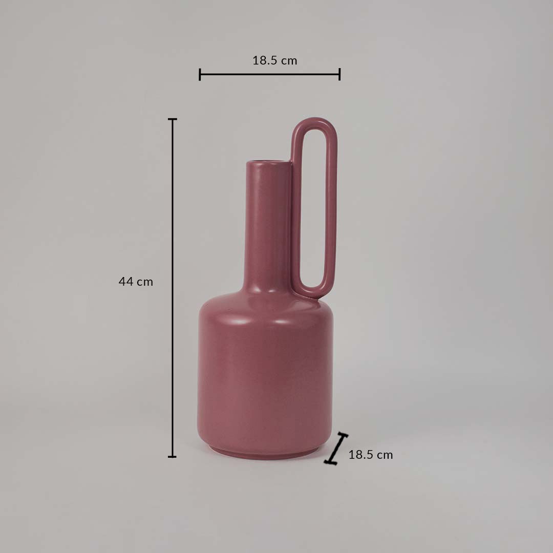 Pink ceramic vase with loop handle shown with dimensions 44 cm height and 18.5 cm width clearly presented against a white background.