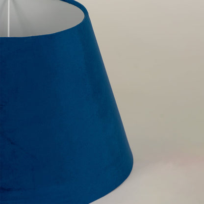 Close view of the blue velvet lampshade showing its soft plush texture and refined tapered design with smooth fabric detailing.