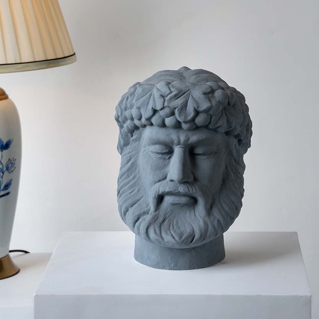 Grey sculpted head vase offering modern artistic décor adding bold sculptural presence creative detailing and contemporary sophistication suitable for premium interior styling.