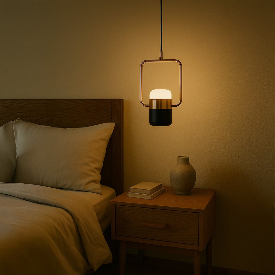 Rose gold frame pendant light with black and white diffuser adding modern elegance to living room dining and home interior decor.