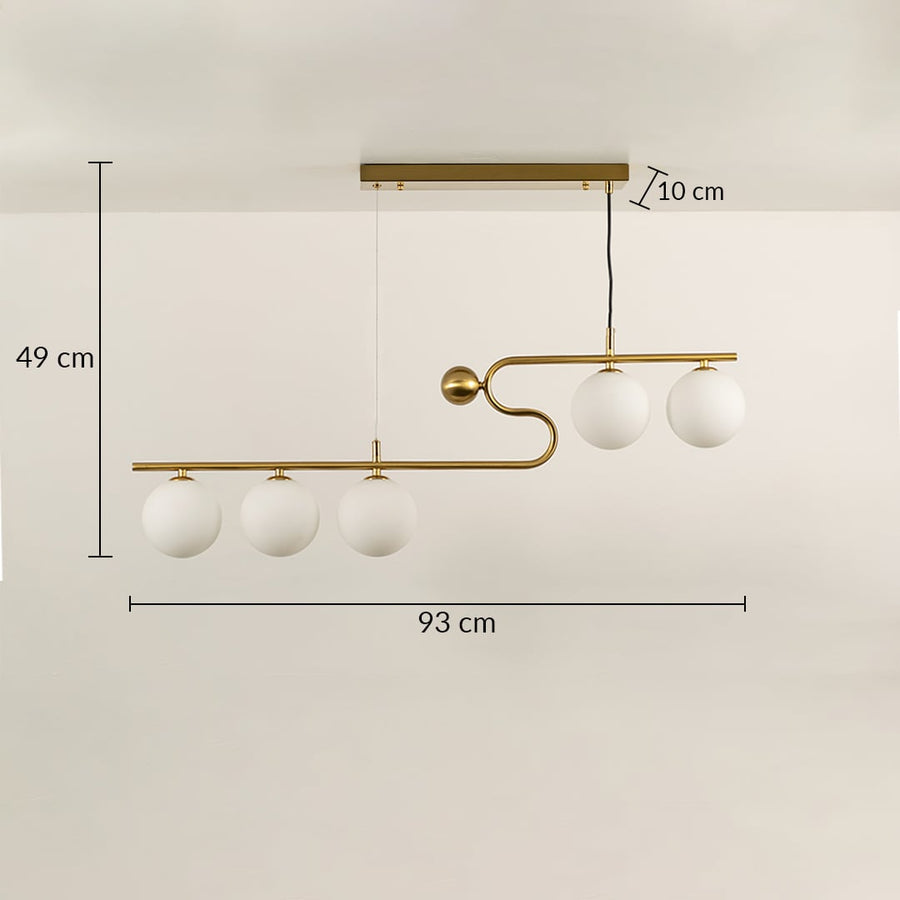 Gold chandelier light with white globe bulbs in a front view measuring 93 cm width and 49 cm height against a plain background with lights on perfect for modern lighting décor.