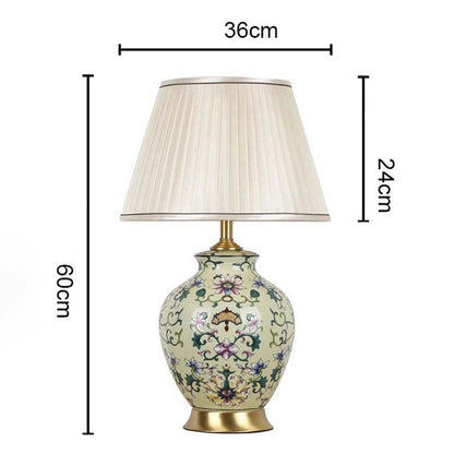 Classic ceramic and metal table lamp measuring 60 cm in height and 36 cm in width with a 24 cm shade ideal for refined interior styling.
