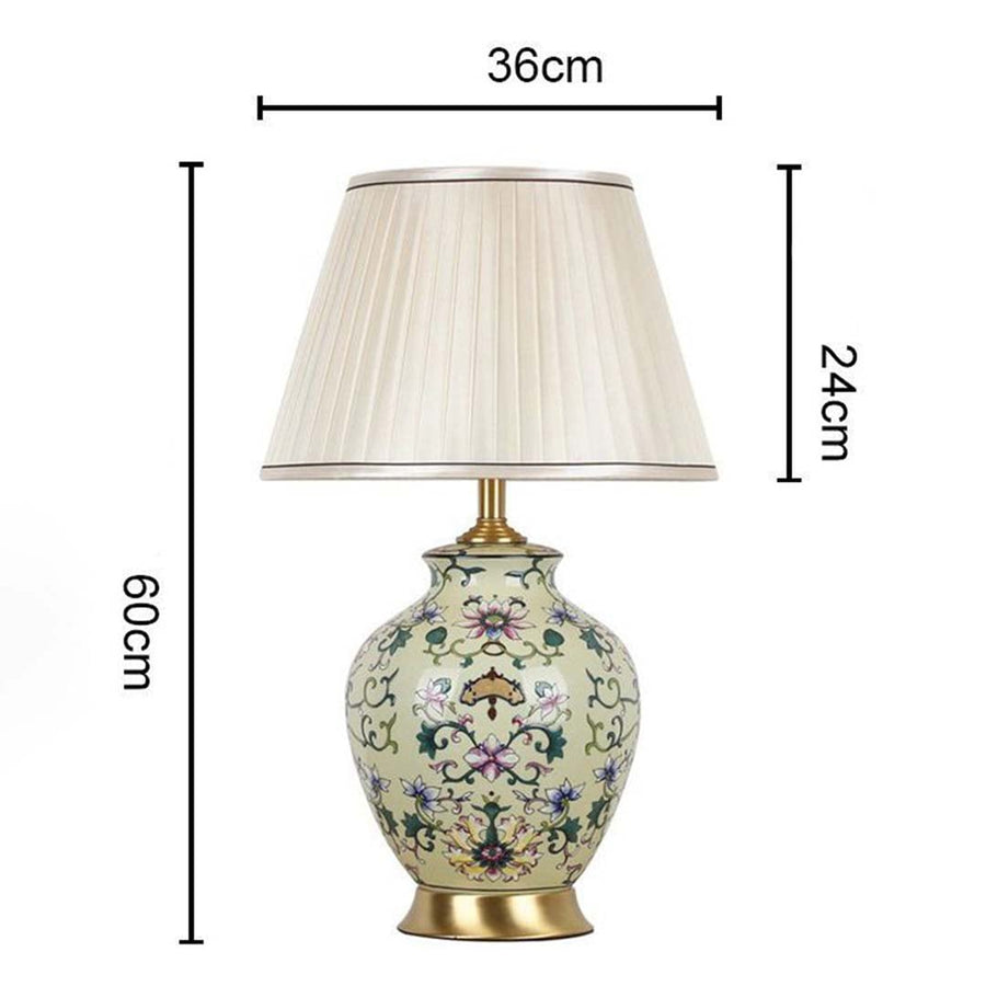 Classic ceramic and metal table lamp measuring 60 cm in height and 36 cm in width with a 24 cm shade ideal for refined interior styling.