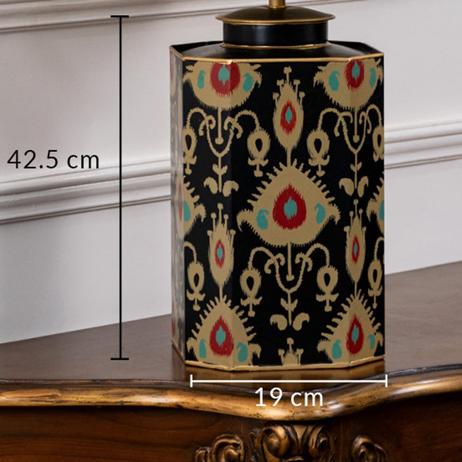 Table lamp with traditional multicolor patterned ceramic base presented with 42.5 cm height and 19 cm width dimensions.