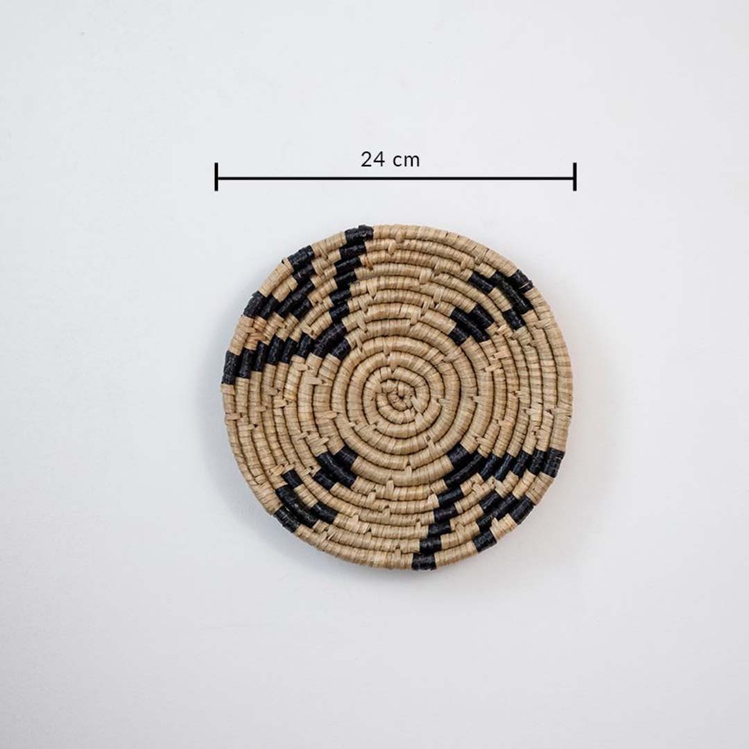 Eco friendly wicker wall hanging basket in beige and black pattern with 24 cm diameter for modern decor.