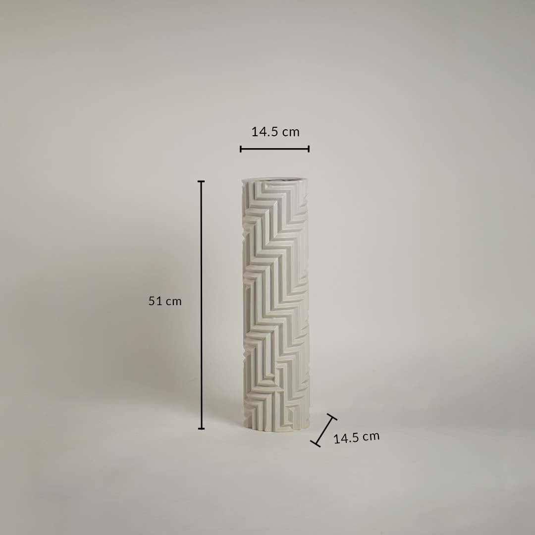 Tall white geometric ceramic vase with 51 cm height and 14.5 cm width displayed on a neutral background with intricate line detailing.