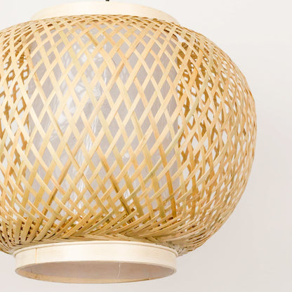 Closeup view of bamboo pendant light showing intricate weaving and natural texture.