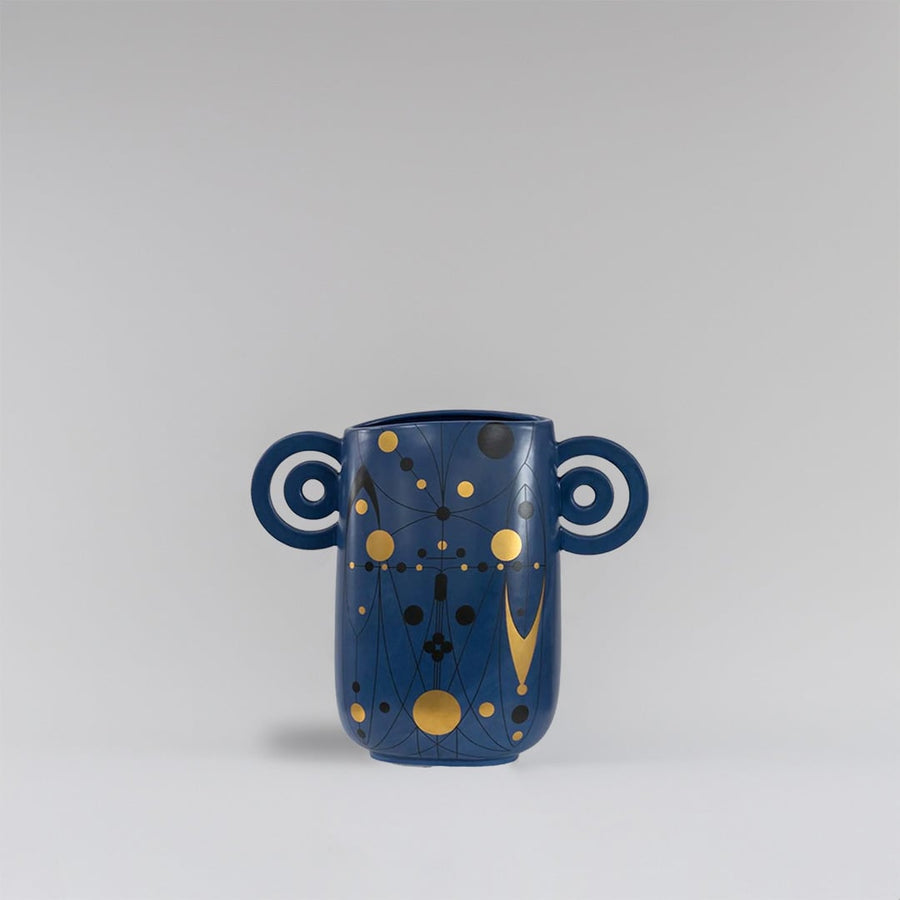 Navy blue ceramic vase with abstract gold detailing and loop handles displayed on a clean white background for modern decor styling.