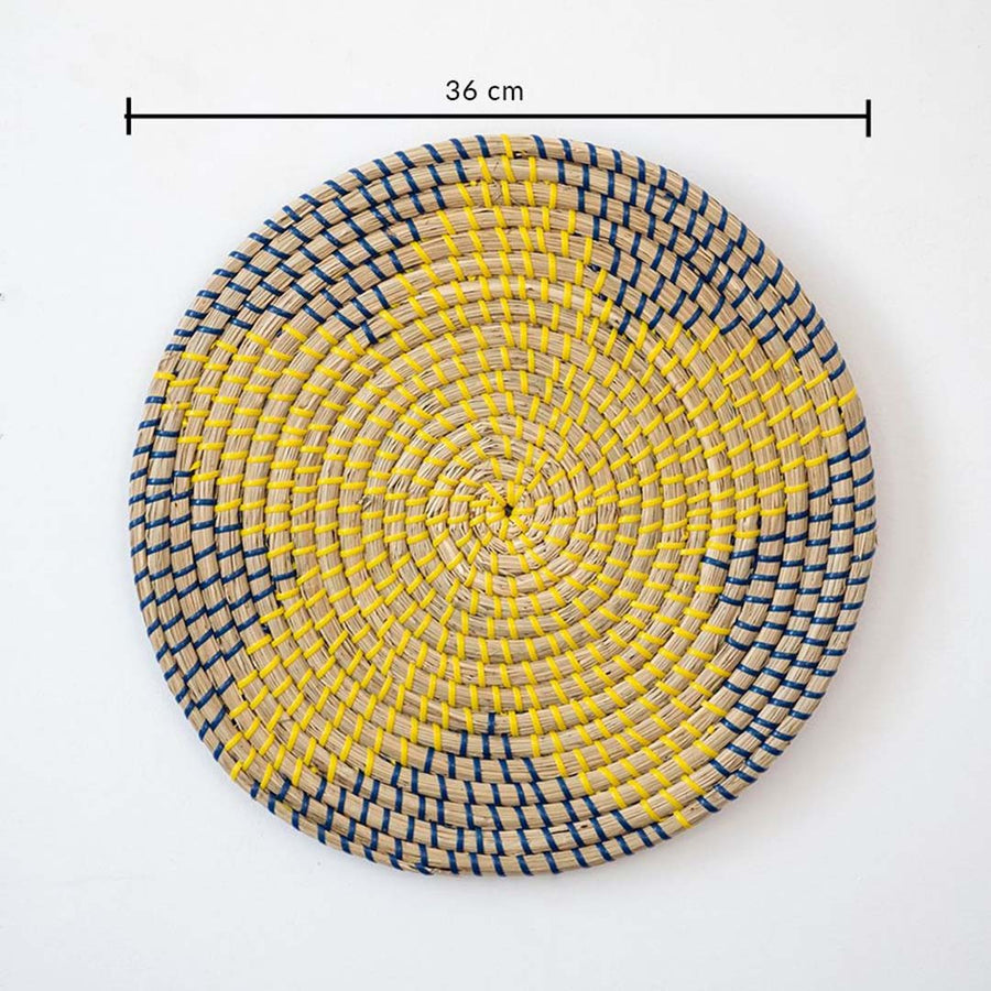 Circular woven wall basket with yellow and black pattern showing 30 cm diameter ideal for accent wall decor styling.
