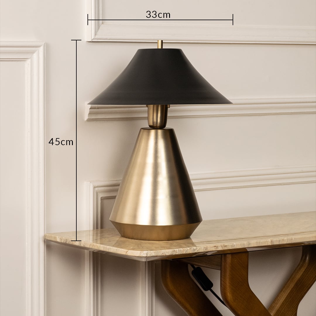 Designer metal table lamp measuring 45 cm in height and 33 cm in width with a sleek black shade and gold base for elegant interior decor.