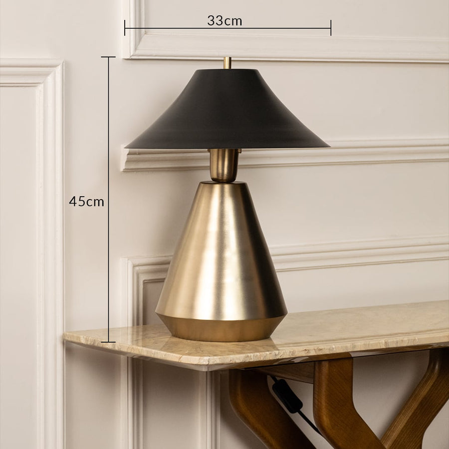 Designer metal table lamp measuring 45 cm in height and 33 cm in width with a sleek black shade and gold base for elegant interior decor.