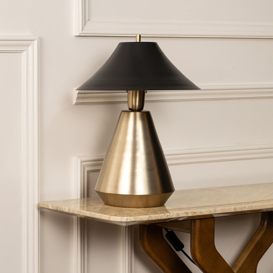Elegant black and gold metal table lamp for luxury bedroom living room and modern interior decor styling.