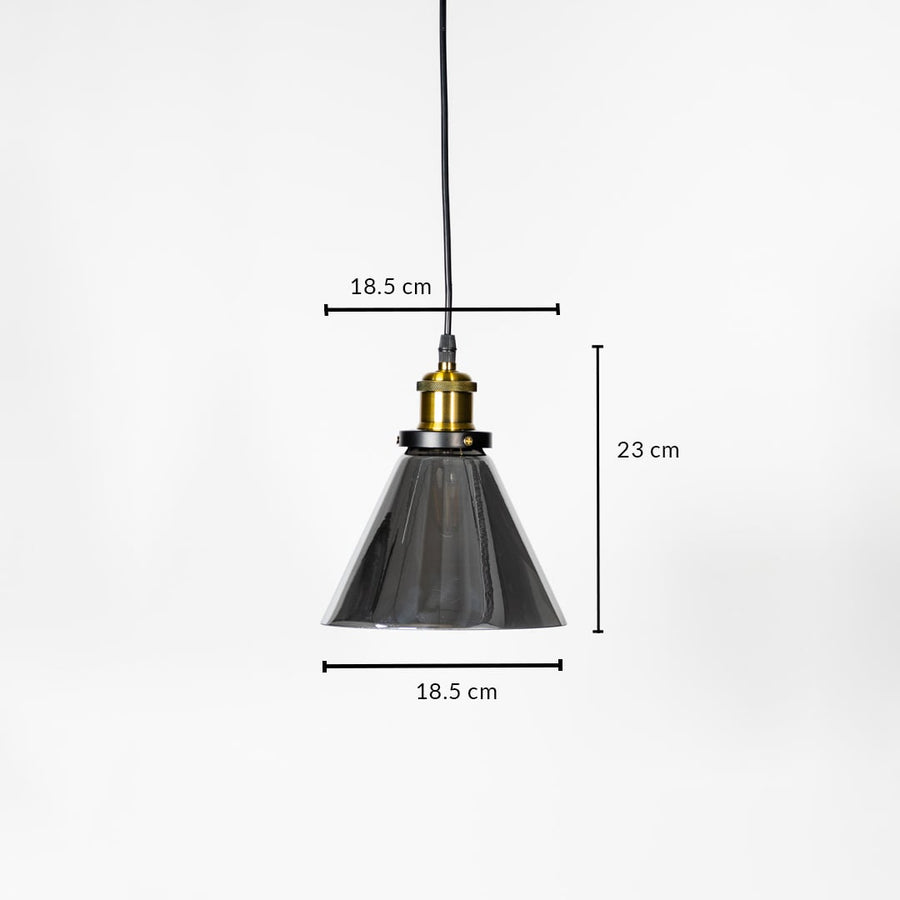 Pendant light with smokey glass shade brass fitting and black cord shown with 23cm height and 18.5cm width.