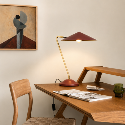 Lifestyle image of paprika finish benton study lamp for elegant home office decor styling and modern desk lighting.