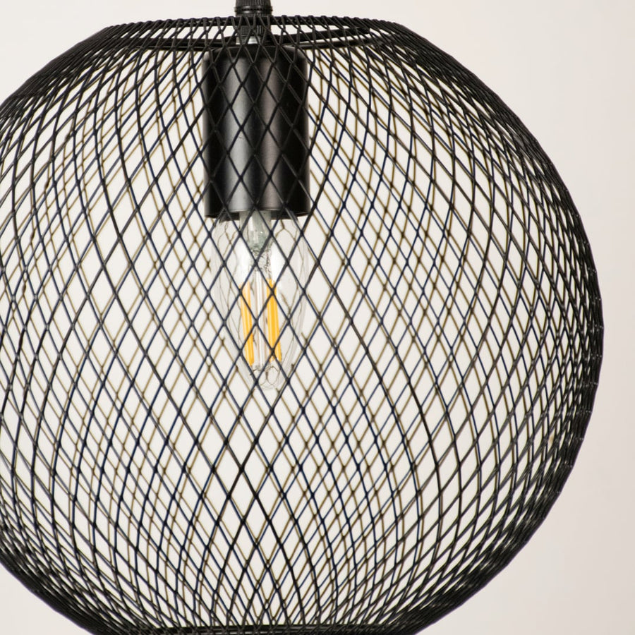 Close view of black mesh pendant light showing detailed craftsmanship smooth metal finish and fine industrial design elegance.