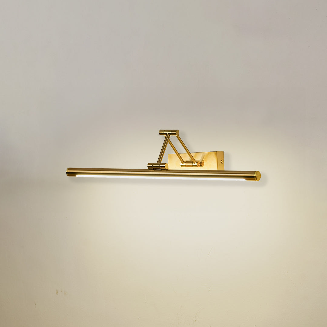 Modern wall light in gold metal finish with linear bar design for bathroom or vanity decor lighting white background.