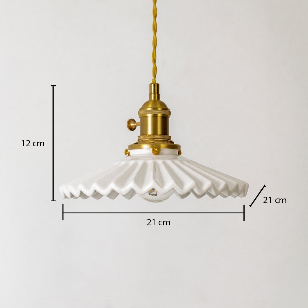 White pleated glass and brass pendant light dimension image with 21 cm width and 12 cm height for dining placement.