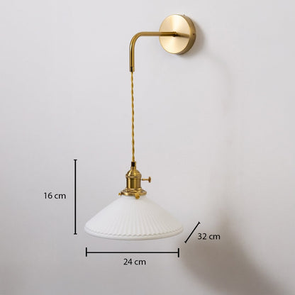 Gold wall light with white ribbed shade shown with 16 cm shade height 24 cm width and 32 cm depth for accurate placement.