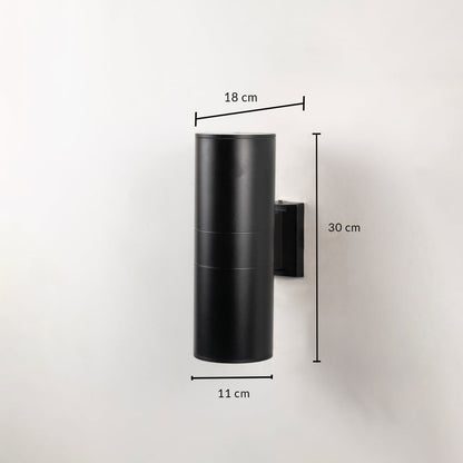 Tall black metal cylindrical outdoor wall light measuring 30 cm height and 11 cm width ideal for contemporary exterior decor.