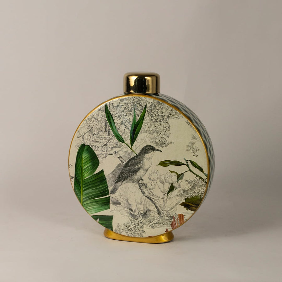 Side angle of tropical bird jar showing smooth round body  glossy surface  and tropical nature design.