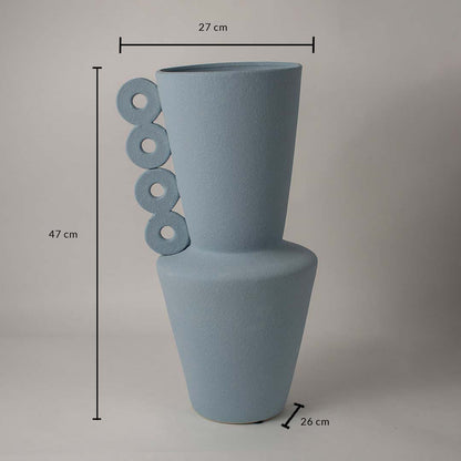 Blue ceramic vase measuring 47 cm height and 27 cm width shown on white background with circular ring handle design.